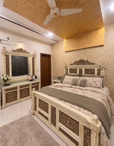 Elegant bed set with side tables for sale
