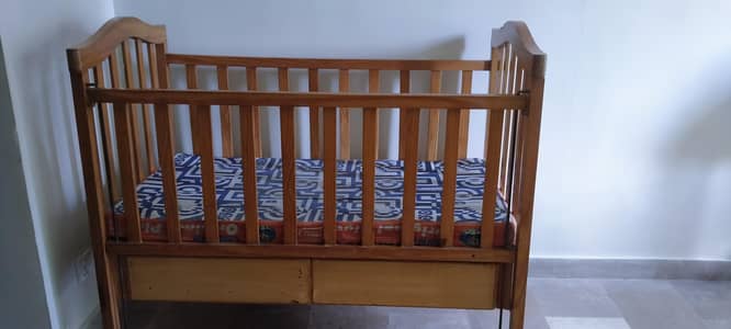 baby cot along with mattress