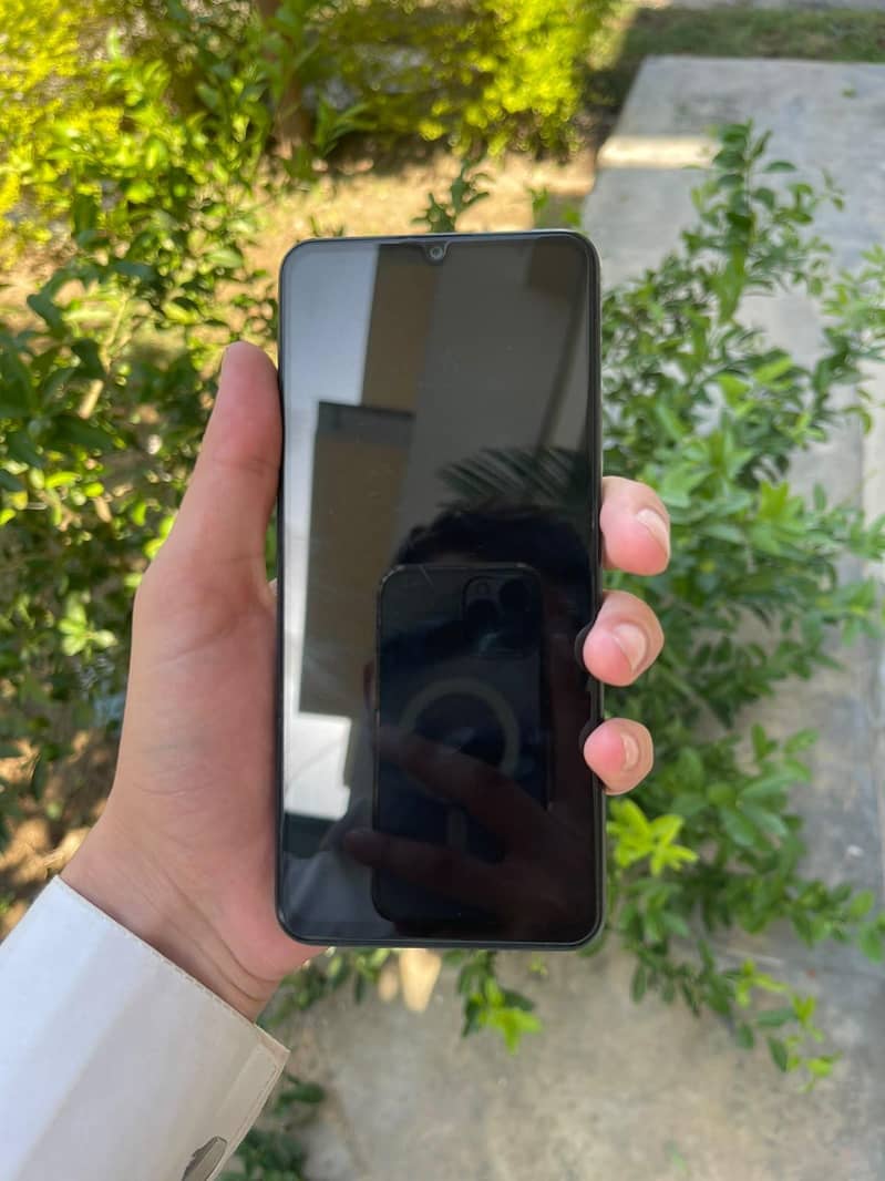 Realme Note 60x 4