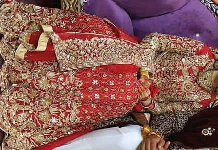 luxury Red bridal lahnga with heavy handmade embroidery worn once only
