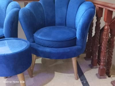 blue coffee chairs with table