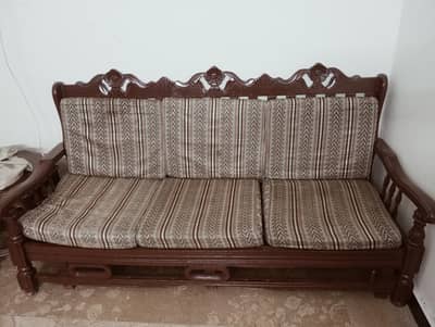 wooden sofa set with cushions