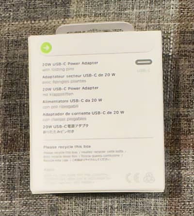I phone original 20 W Power Adapter. Pin pack G Next.