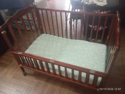 Zubaida's wooden cott for babies, small kids with wheels