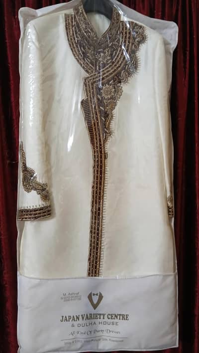 sherwani with maroon kullah
