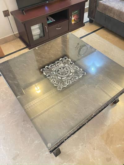 wooden centre table with glass