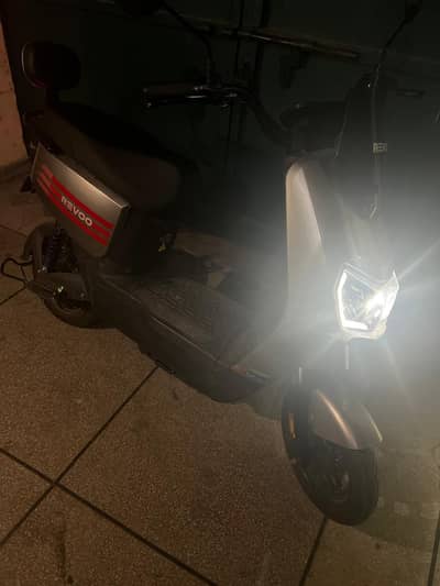 scooty electric, silver color