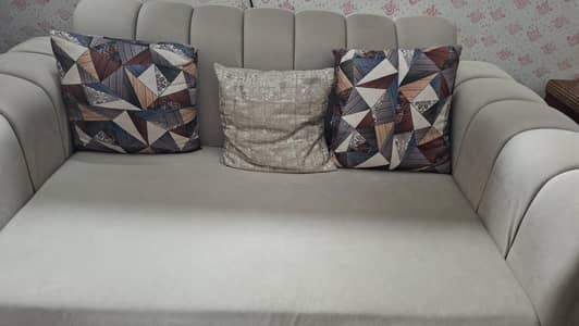 2 seater sofa Colour grey condition excellent