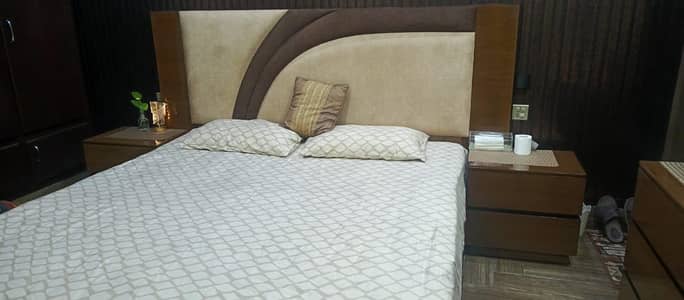 slightly use bed available in good condition with dressing