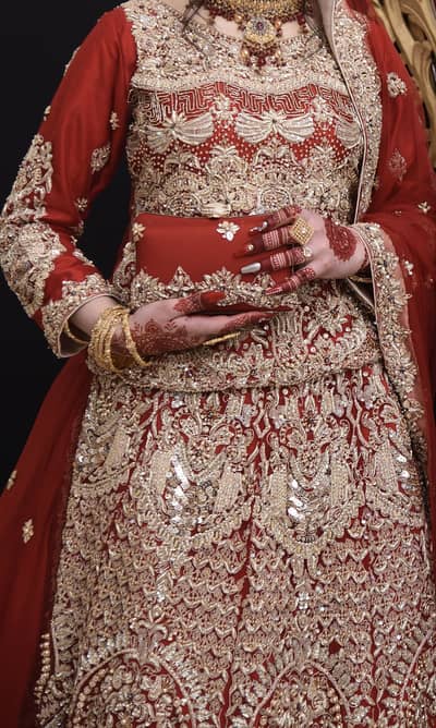 Luxury Red Bridal Lehenga with Heavy Handmade work