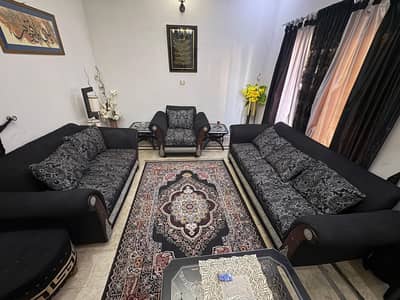 black elegant sofa set with beautiful floral design