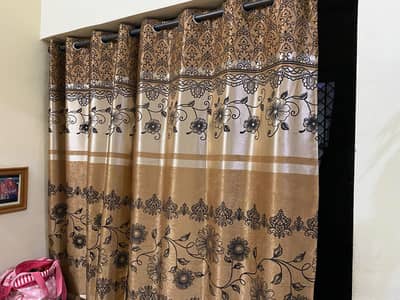 3 curtains in golen colour full highted. just in 4500 rupees