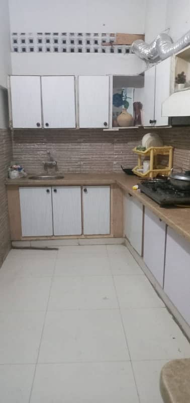 Portion For Rent Gulshan Iqbal block 2 2nd Floor 2 Bed DD Rent Demand 60000 180 square yards *Code(16929)*