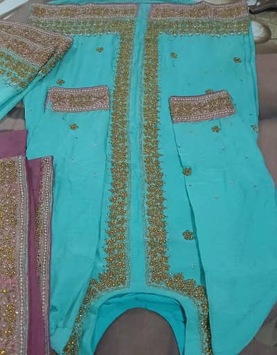 : Beautiful Turquoise Pink Lehenga with Golden Work