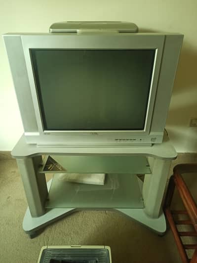TCL TV in Good Working Condition + TV Table for Sale