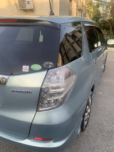 Honda fit shuttle 12/15 isl number