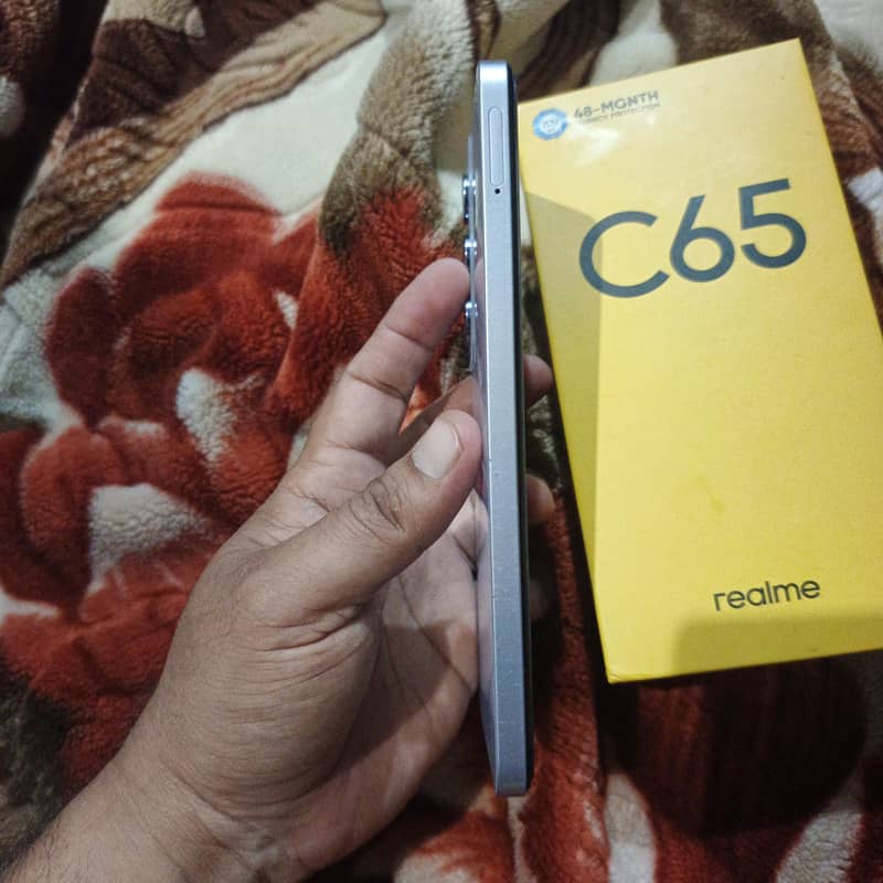 Realme C65 4