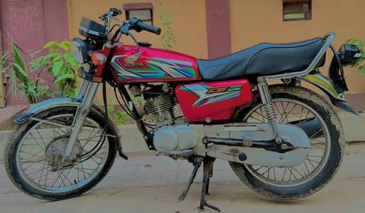Honda 125 white good condition