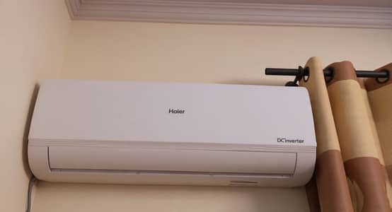 Almost new Haier dc inverter with waranty card
