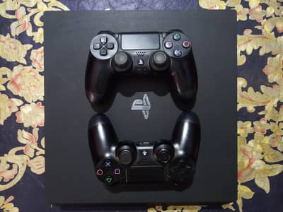 PlayStation 4 Pro 1tb with controllers and games