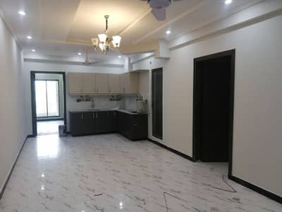 Premium 2-Bed Apartment for Sale in Madina Tower, E-11/4, Islamabad Investor Deal.