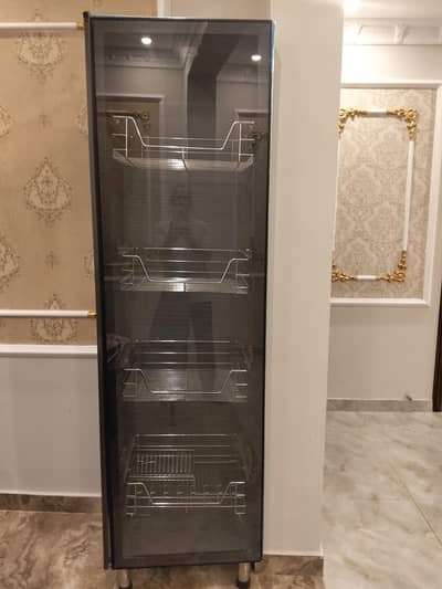 kitchen cabinet with light and steel racks