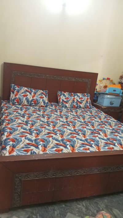 double bed with side table