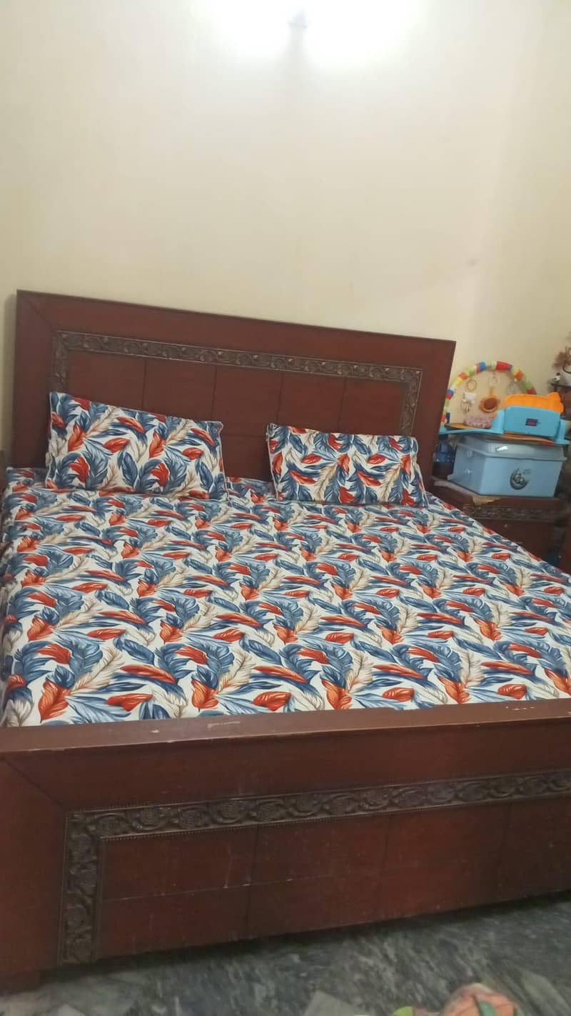 double bed with side table 0
