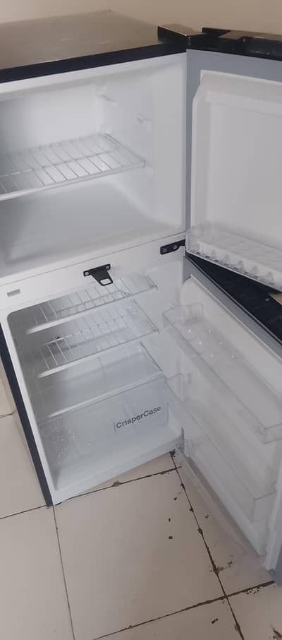 9140 WB E-chrome Dawlance double door refrigerator in silver color