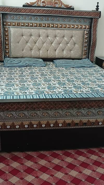 2 single beds , 1 double bed with side tables, dressing and wardrobe.