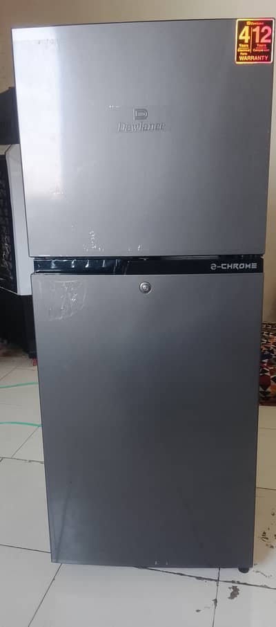 9140 WB E-chrome Dawlance refrigerator in silver color