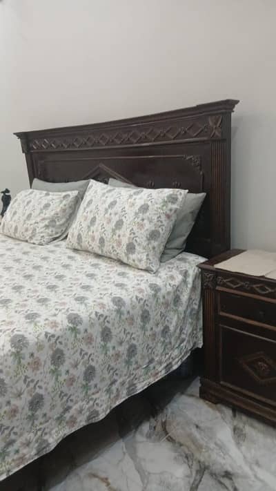 Wooden double bed for sale