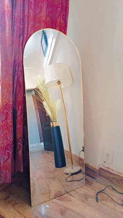 standing mirror in brand new condition along with two side tables!!!