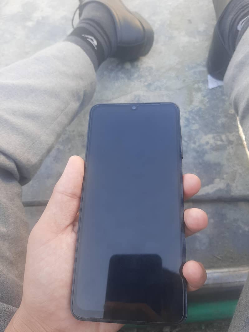 Samsung Mobile A06 1
