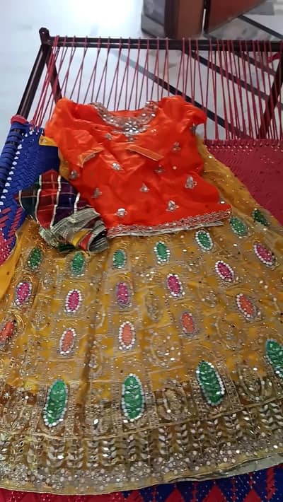 Mustard Yellow Bridal Lehenga with Orange Blouse