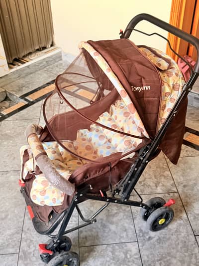Baby pram 10/10 condition in throwaway price .