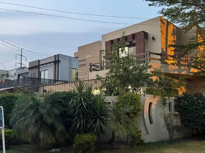 D H A Lahore 1 kanal Owner Build Design Corner House with 100% original pics Available For Sale