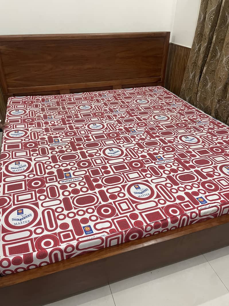 double bed with matters 0