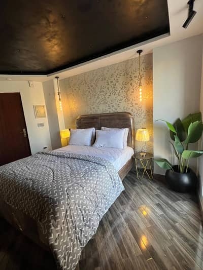 Daily Basis Apartment & Rooms Per day Perweek Short stay Available in E-11 Islamabad
