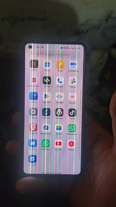 One Plus 9 mobile with charger