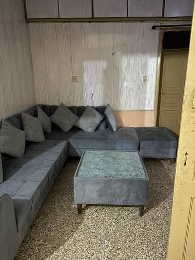 L shaped king size sofa with table