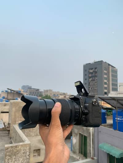 nikon d7000 with 18/105 lense and all asseries all ok camera mic optio