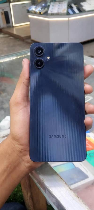 Samsung Mobile A06 with original box and charger