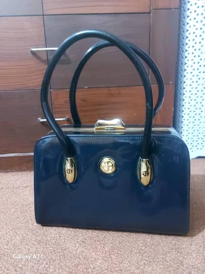 royal blue shiny hand bag