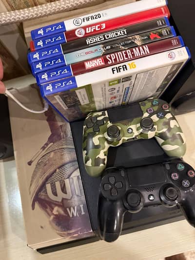 ps4 fat for sale with games and 2 controllers in reasonable price.