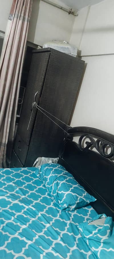 Bed and Almari and computer table and table uses for dinner study's