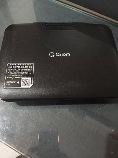 original QRiOM portable DVD player
