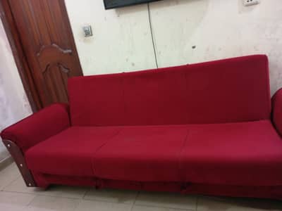 mahroon sofa cum bed