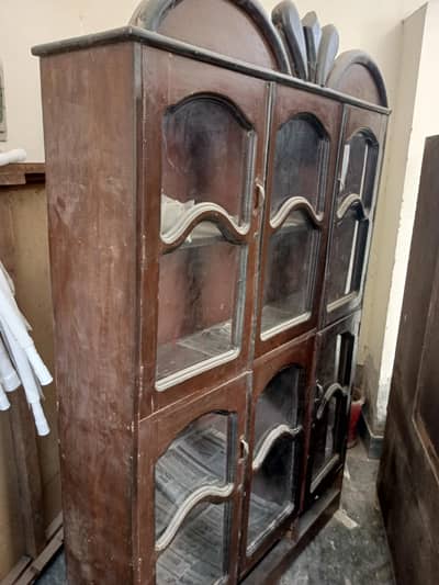 1 double bed complete 1singhaar maiz 1showcase condition 10by 9