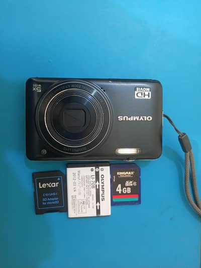 Olympus camera with 4GB card with card jakit